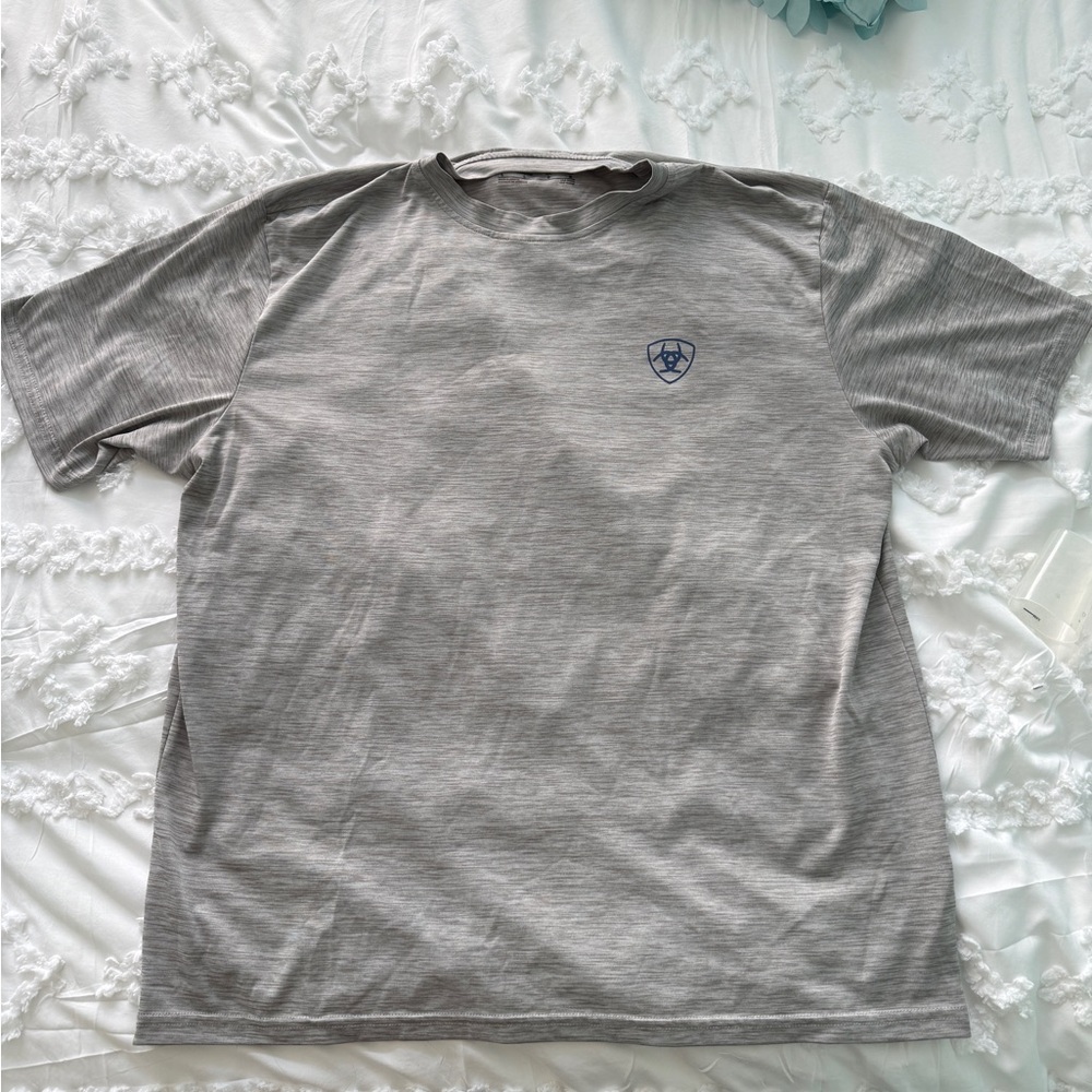 Ariat Gray Short Sleeve Tee with Blue Vertical USA Flag on back.